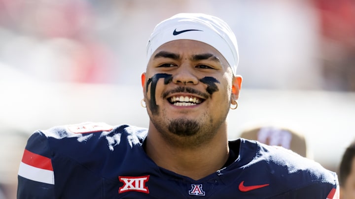 Nov 22, 2025; Tucson, Arizona, USA; Arizona Wildcats offensive lineman Rhino Tapa'atoutai (59) against the Baylor Bears at Casino Del Sol Stadium. Mandatory Credit: Mark J. Rebilas-Imagn Images