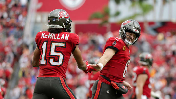 Dec 29, 2024; Tampa, Florida, USA; Tampa Bay Buccaneers wide receiver Jalen McMillan (15) celebrates with quarterback Baker Mayfield (6) after a touchdown  against the Carolina Panthers in the fourth quarter at Raymond James Stadium. Mandatory Credit: Nathan Ray Seebeck-Imagn Images