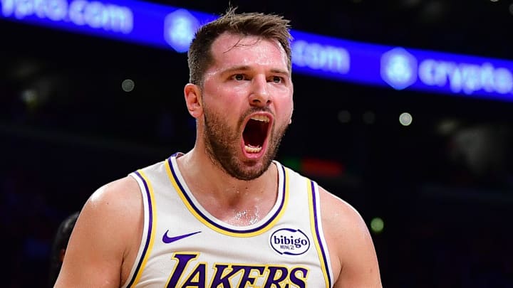 Jan 18, 2026; Los Angeles, California, USA; Los Angeles Lakers guard Luka Doncic (77) reacts during the first half at Crypto.com Arena. Mandatory Credit: Gary A. Vasquez-Imagn Images