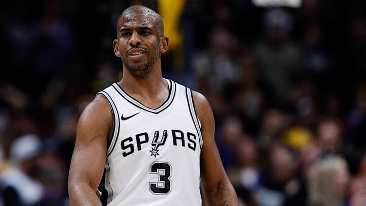 Apr 2, 2025; Denver, Colorado, USA; San Antonio Spurs guard Chris Paul (3) in the first quarter against the Denver Nuggets at Ball Arena.