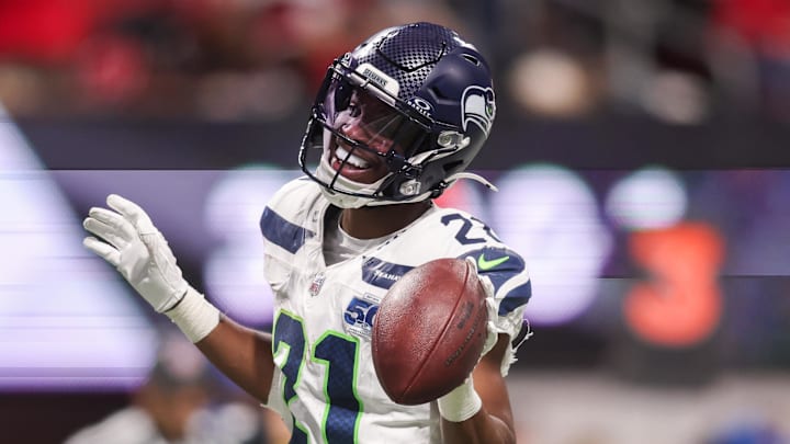 Dec 7, 2025; Atlanta, Georgia, USA; Seattle Seahawks cornerback Devon Witherspoon (21) celebrates after a fumble recovery against the Atlanta Falcons in the third quarter at Mercedes-Benz Stadium. Dec 7, 2025; Atlanta, Georgia, USA; Seattle Seahawks cornerback Devon Witherspoon (21) celebrates after a fumble recovery against the Atlanta Falcons in the third quarter at Mercedes-Benz Stadium.