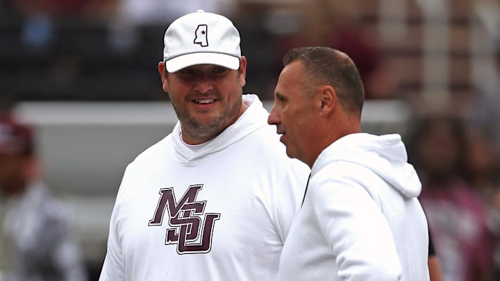 Mississippi State Bulldogs head coach Jeff Lebby and Texas Longhorns head coach Steve Sarkisian talk prior to the game at Davis Wade Stadium at Scott Field. Mississippi State Bulldogs head coach Jeff Lebby and Texas Longhorns head coach Steve Sarkisian talk prior to the game at Davis Wade Stadium at Scott Field.