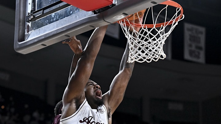 Texas A&M Aggies forward Rashaun Agee (12) dunks the ball against the Mississippi State Bulldogs during the first half at Reed Arena. 