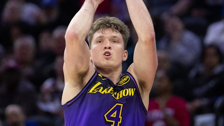 Jan 28, 2025; Philadelphia, Pennsylvania, USA; Los Angeles Lakers guard Dalton Knecht (4) shoots against the Philadelphia 76ers during the second quarter at Wells Fargo Center. Mandatory Credit: Bill Streicher-Imagn Images
