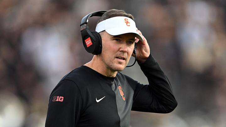 Sep 13, 2025; West Lafayette, Indiana, USA; Southern California Trojans head coach Lincoln Riley stands on the sidelines during the first quarter against the Purdue Boilermakers at Ross-Ade Stadium. Mandatory Credit: Marc Lebryk-Imagn Images Sep 13, 2025; West Lafayette, Indiana, USA; Southern California Trojans head coach Lincoln Riley stands on the sidelines during the first quarter against the Purdue Boilermakers at Ross-Ade Stadium. Mandatory Credit: Marc Lebryk-Imagn Images
