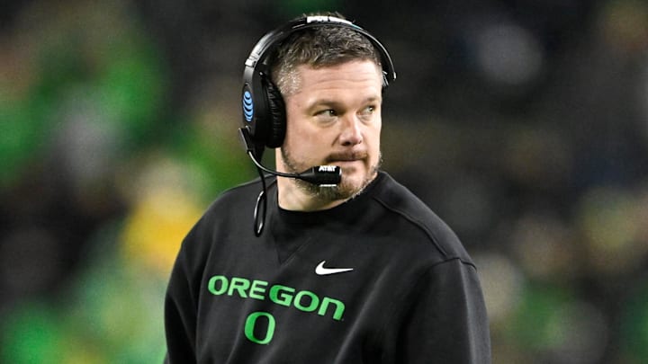 Dec 20, 2025; Eugene, OR, USA;  Oregon Ducks head coach Dan Lanning looks on during the fourth quarter against the James Madison Dukes at Autzen Stadium. Mandatory Credit: Craig Strobeck-Imagn Images