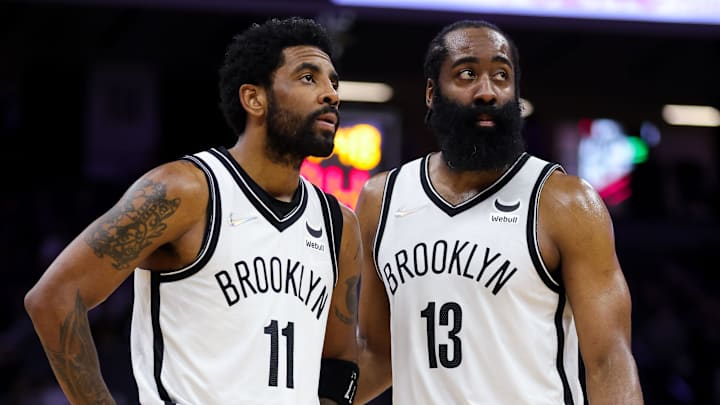 Feb 2, 2022; Sacramento, California, USA; Brooklyn Nets guard Kyrie Irving (11) and guard James Harden (13) talk during the fourth quarter against the Sacramento Kings at Golden 1 Center. Mandatory Credit: Sergio Estrada-Imagn Images Feb 2, 2022; Sacramento, California, USA; Brooklyn Nets guard Kyrie Irving (11) and guard James Harden (13) talk during the fourth quarter against the Sacramento Kings at Golden 1 Center. Mandatory Credit: Sergio Estrada-Imagn Images