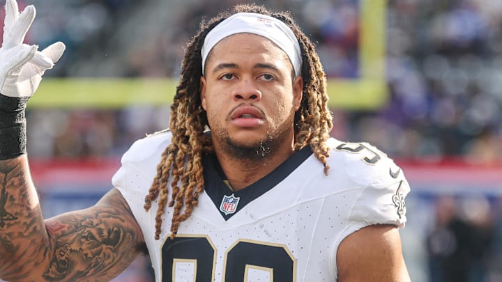 Dec 8, 2024; East Rutherford, New Jersey, USA; New Orleans Saints defensive end Chase Young (99) looks up at fans before the game against the New York Giants at MetLife Stadium. Mandatory Credit: Vincent Carchietta-Imagn Images