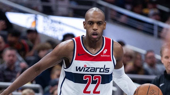 Nov 28, 2025; Indianapolis, Indiana, USA;  Washington Wizards forward Khris Middleton (22) dribbles the ball while  Indiana Pacers forward Pascal Siakam (43) defends in the second half at Gainbridge Fieldhouse. Mandatory Credit: Trevor Ruszkowski-Imagn Images