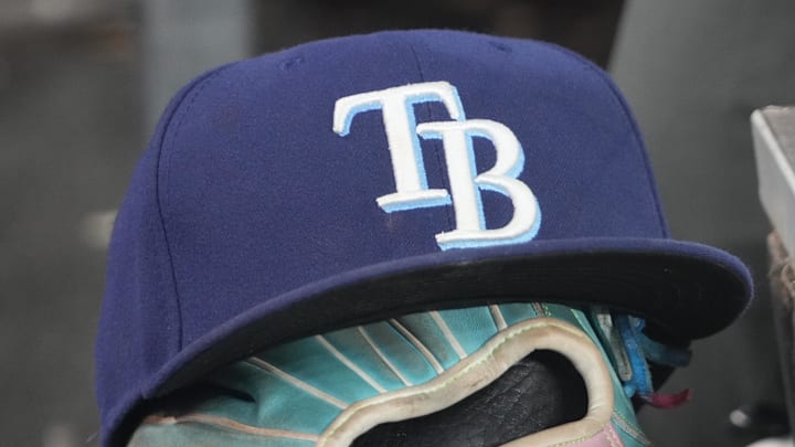 Sep 26, 2025; Toronto, Ontario, CAN; The hat and glove of Tampa Bay Rays third baseman Junior Caminero (13) in the dugout during the game against the Toronto Blue Jays at Rogers Centre. Sep 26, 2025; Toronto, Ontario, CAN; The hat and glove of Tampa Bay Rays third baseman Junior Caminero (13) in the dugout during the game against the Toronto Blue Jays at Rogers Centre.