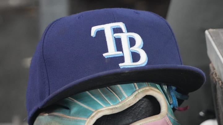 Sep 26, 2025; Toronto, Ontario, CAN; The hat and glove of Tampa Bay Rays third baseman Junior Caminero (13) in the dugout during the game against the Toronto Blue Jays at Rogers Centre. Sep 26, 2025; Toronto, Ontario, CAN; The hat and glove of Tampa Bay Rays third baseman Junior Caminero (13) in the dugout during the game against the Toronto Blue Jays at Rogers Centre.