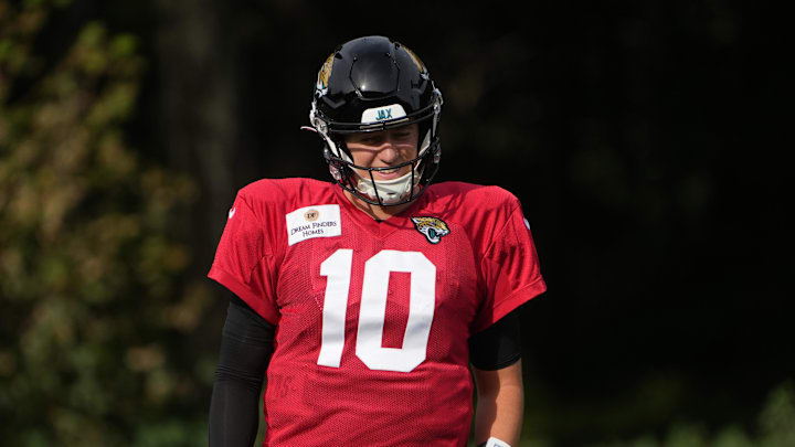 Oct 17, 2024; Watford, United Kingdom; Jacksonville Jaguars quarterback Mac Jones (10) during practice at The Grove. Mandatory Credit: Kirby Lee-Imagn Images