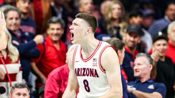 Jan 21, 2026; Tucson, Arizona, USA; Arizona Wildcats forward Ivan Kharchenkov (8) celebrates during the second half of the game against the Cincinnati Bearcats at McKale Memorial Center. Mandatory Credit: Aryanna Frank-Imagn Images