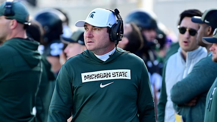 Nov 2, 2024; East Lansing, Michigan, USA;  Michigan State Spartans head coach Jonathan Smith looks over his sidelines during the first quarter against the Indiana Hoosiers at Spartan Stadium. Mandatory Credit: Dale Young-Imagn Images