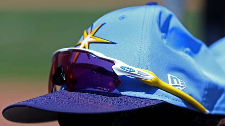 Mar 21, 2018; Port Charlotte, FL, USA; A view of Oakley sunglasses on the New Era Spring Training hat in the game of the Boston Red Sox against the Tampa Bay Rays at Charlotte Sports Park. Mar 21, 2018; Port Charlotte, FL, USA; A view of Oakley sunglasses on the New Era Spring Training hat in the game of the Boston Red Sox against the Tampa Bay Rays at Charlotte Sports Park.