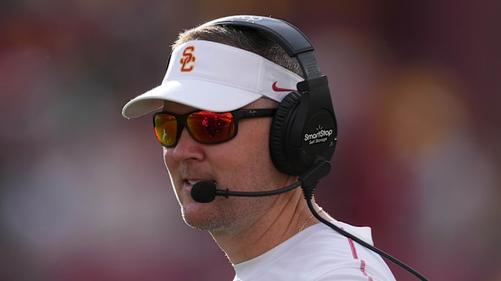 Nov 30, 2024; Los Angeles, California, USA; Southern California Trojans head coach Lincoln Riley reacts against the Notre Dame Fighting Irish in the second half at United Airlines Field at Los Angeles Memorial Coliseum. Mandatory Credit: Kirby Lee-Imagn Images