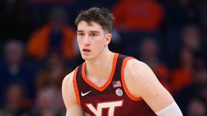 Jan 21, 2026; Syracuse, New York, USA; Virginia Tech Hokies guard Neoklis Avdalas (17) dribbles up the court during the first half against the Syracuse Orange at the JMA Wireless Dome. Mandatory Credit: Rich Barnes-Imagn Images