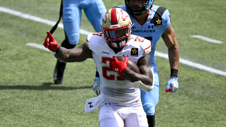 Mar 30, 2024; Arlington, TX, USA; Birmingham Stallions running back Ricky Person (23) runs for a touchdown past Arlington Renegades linebacker Storey Jackson (16) during the second half at Choctaw Stadium. Mandatory Credit: Jerome Miron-USA TODAY Sports