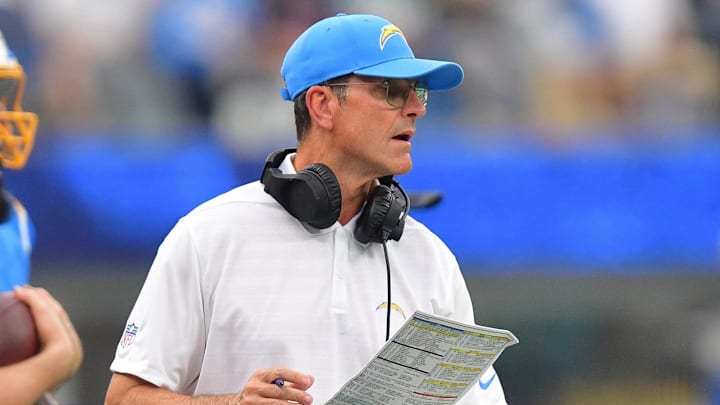 Oct 27, 2024; Inglewood, California, USA; Los Angeles Chargers head coach Jim Harbaugh watches game action against the New Orleans Saints during the second half at SoFi Stadium. Mandatory Credit: Gary A. Vasquez-Imagn Images