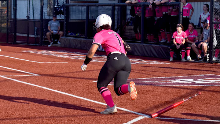 Assumption High School (Louisville) senior Maleya Giddens races to first base in a game against Denmark High School (Wisconsin) Thursday, March 26, 2026. Both teams are defending state champions.