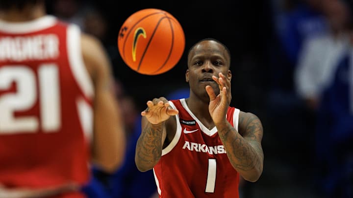Arkansas Razorbacks guard Johnell Davis (1) passes the ball to guard D.J. Wagner (21) during the second half against the Kentucky Wildcats at Rupp Arena at Central Bank Center. Arkansas Razorbacks guard Johnell Davis (1) passes the ball to guard D.J. Wagner (21) during the second half against the Kentucky Wildcats at Rupp Arena at Central Bank Center.