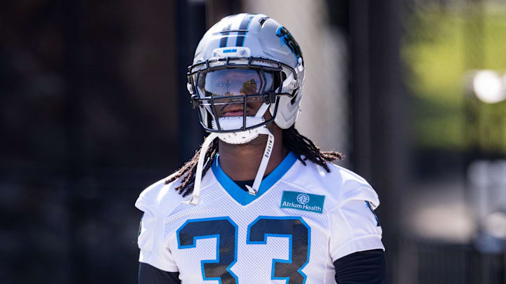 Jul 24, 2025; Charlotte, NC, USA; Carolina Panthers linebacker Princely Umanmielen (33) walks up to training camp. 