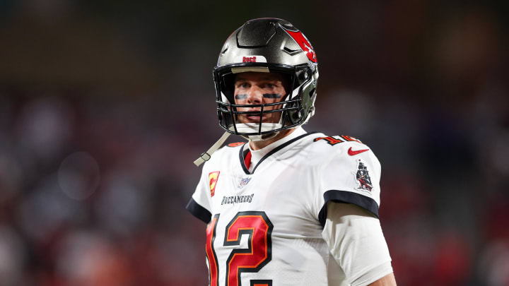 Jan 16, 2023; Tampa, Florida, USA; Tampa Bay Buccaneers quarterback Tom Brady (12) looks on before a  wild card game against the Dallas Cowboys at Raymond James Stadium. Mandatory Credit: Nathan Ray Seebeck-USA TODAY Sports