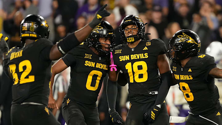Sep 26, 2025; Tempe, Arizona, USA; Arizona State Sun Devils linebacker Martell Hughes (18) celebrates a game-winning interception with defensive lineman Prince Dorbah (32), defensive back Rodney Bimage Jr. (0) and linebacker Jordan Crook (8) against TCU Horned Frogs in the second half at Mountain America Stadium, Home of the ASU Sun Devils. Mandatory Credit: Jacob Reiner-Imagn Images Sep 26, 2025; Tempe, Arizona, USA; Arizona State Sun Devils linebacker Martell Hughes (18) celebrates a game-winning interception with defensive lineman Prince Dorbah (32), defensive back Rodney Bimage Jr. (0) and linebacker Jordan Crook (8) against TCU Horned Frogs in the second half at Mountain America Stadium, Home of the ASU Sun Devils. Mandatory Credit: Jacob Reiner-Imagn Images