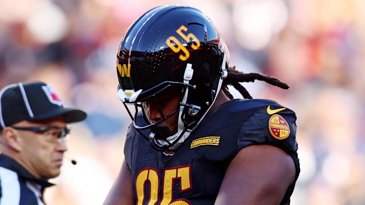 Oct 27, 2024; Landover, Maryland, USA; Washington Commanders defensive tackle Jer'Zhan Newton (95) celebrates after a sack during the first quarter ab at Commanders Field. Mandatory Credit: Peter Casey-Imagn Images