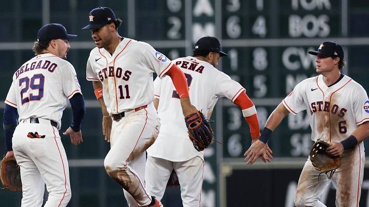 Houston Astros right fielder Cam Smith (11) celebrates the win against the Detroit Tigers with second baseman Raynel Delgado (29) catcher Christian Vázquez (2) and center fielder Jake Meyers (6). Houston Astros right fielder Cam Smith (11) celebrates the win against the Detroit Tigers with second baseman Raynel Delgado (29) catcher Christian Vázquez (2) and center fielder Jake Meyers (6).
