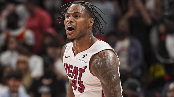 Apr 18, 2025; Atlanta, Georgia, USA; Miami Heat guard Davion Mitchell (45) reacts after the Heat defeat the Atlanta Hawks in overtime at State Farm Arena. Mandatory Credit: Dale Zanine-Imagn Images