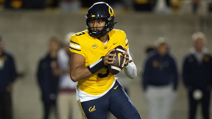 Sep 13, 2025; Berkeley, California, USA; California Golden Bears quarterback Jaron-Keawe Sagapolutele (3) rolls out to pass against the Minnesota Golden Gophers during the fourth quarter at California Memorial Stadium. Mandatory Credit: D. Ross Cameron-Imagn Images