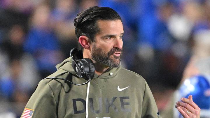 Nov 15, 2025; Durham, North Carolina, USA; Duke Blue Devils head coach Manny Diaz reacts during the third quarter against the Virginia Cavaliers at Wallace Wade Stadium. Mandatory Credit: Zachary Taft-Imagn Images Nov 15, 2025; Durham, North Carolina, USA; Duke Blue Devils head coach Manny Diaz reacts during the third quarter against the Virginia Cavaliers at Wallace Wade Stadium. Mandatory Credit: Zachary Taft-Imagn Images