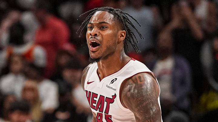 Atlanta, Georgia, USA; Miami Heat guard Davion Mitchell (45) reacts after the Heat defeat the Atlanta Hawks in overtime at State Farm Arena. Mandatory Credit: Dale Zanine-Imagn Images