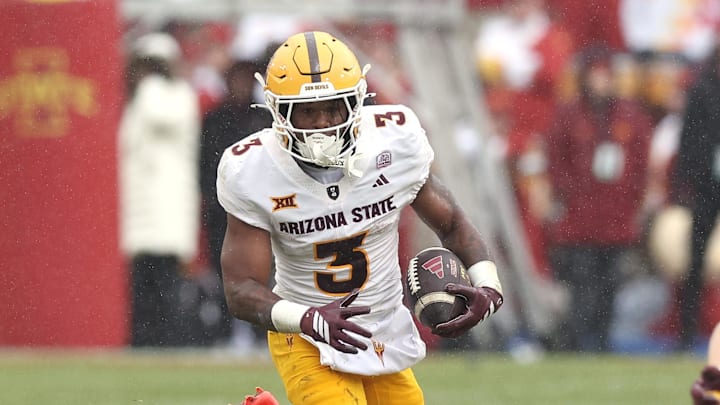 Arizona State Sun Devils running back Raleek Brown (3) runs the football against the Iowa State Cyclones during the first half at Jack Trice Stadium. 
