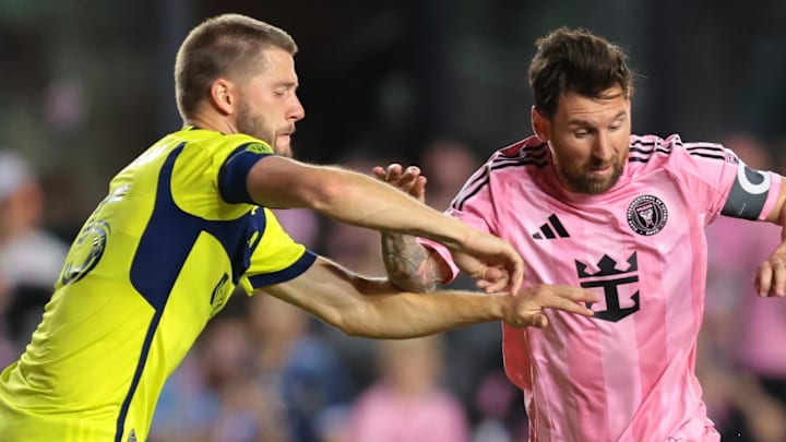 Walker Zimmerman (left) and Lionel Messi (right) face off for the third time in three weeks.