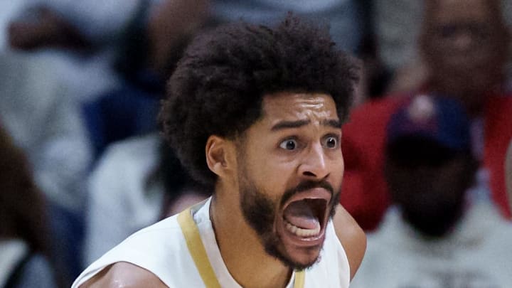 Dec 26, 2025; New Orleans, Louisiana, USA; New Orleans Pelicans guard Jordan Poole (3) reacts after a no foul call against Phoenix Suns forward Royce O'Neale (00) during the first half at Smoothie King Center. Mandatory Credit: Matthew Hinton-Imagn Images