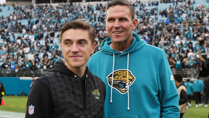 Jan 4, 2026; Jacksonville, Florida, USA; Jacksonville Jaguars general manager James Gladstone (left) and executive vice president of football operations Tony Boselli stand on the field after the game against the Tennessee Titans at EverBank Stadium. 
