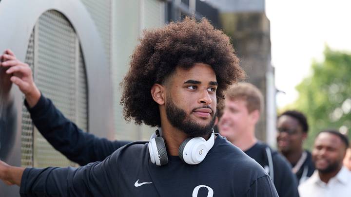 Sep 5, 2026; Eugene, Oregon, USA; Oregon Ducks quarterback Dante Moore (5) touches “The O” on his way to the locker room before a game against the Boise State Broncos at Autzen Stadium. Sep 5, 2026; Eugene, Oregon, USA; Oregon Ducks quarterback Dante Moore (5) touches “The O” on his way to the locker room before a game against the Boise State Broncos at Autzen Stadium.
