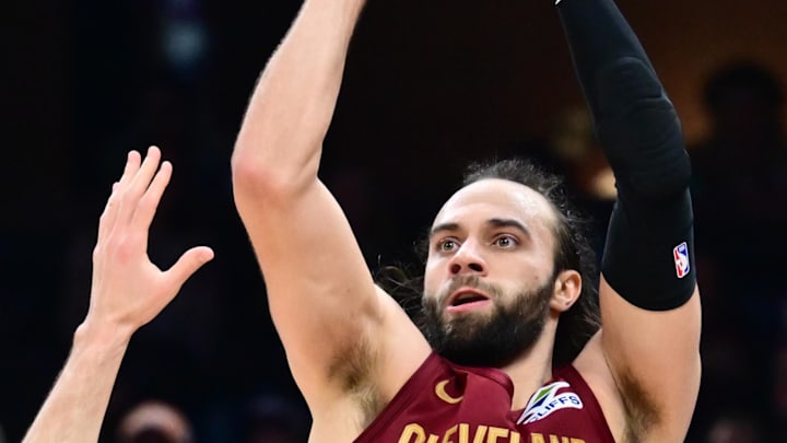 Mar 15, 2026; Cleveland, Ohio, USA; Cleveland Cavaliers guard Max Strus (2) shoots over the defense of  Dallas Mavericks guard John Poulakidas (1) during the second half at Rocket Arena. Mandatory Credit: Ken Blaze-Imagn Images