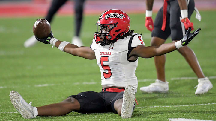 Opelika's Karson Moss (5) celebrates intercepting aPike Road pass during their game on the Pike Road High School campus in Pike Road, Ala., on Friday September 27, 2024.