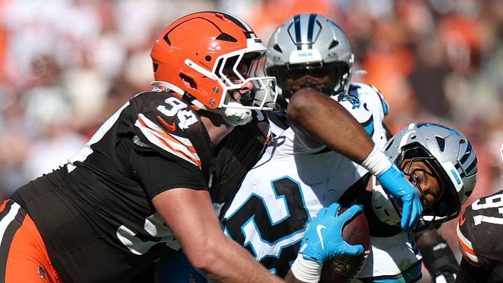 Cleveland Browns defensive tackle Mason Graham tackles Carolina Panthers running back AJ Dillon. Cleveland Browns defensive tackle Mason Graham tackles Carolina Panthers running back AJ Dillon.