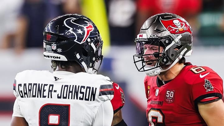 Baker Mayfield and C.J. Gardner-Johnson exchange words during a game between the Tampa Bay Buccaneers and the Houston Texans.