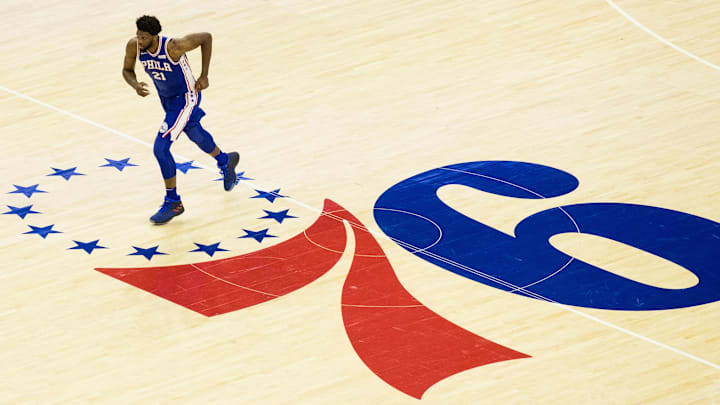 Jan 3, 2018; Philadelphia, PA, USA; General view as Philadelphia 76ers center Joel Embiid (21) runs across the   center court logo during the third quarter against the San Antonio Spurs at Wells Fargo Center. Mandatory Credit: Bill Streicher-Imagn Images