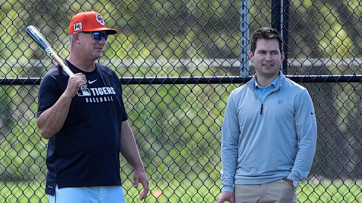 From left, manager A.J. Hinch, talks to president of baseball operation Scott Harris and general manager Jeff Greenberg during spring training at TigerTown in Lakeland, Fla. on Saturday, Feb. 15, 2025.