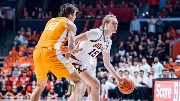 Illinois forward (15) Jake Davis makes a move against Tennessee forward Cade Phillips in the Illinis 66-64 defeat against the Volunteers last Saturday at State Farm Center in Champaign, Illinois.