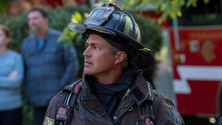 CHICAGO FIRE -- "Mercy" Episode 1404 -- Pictured: (l-r) Taylor Kinney as Kelly Severide, David Eigenberg as Christopher Herrmann 
