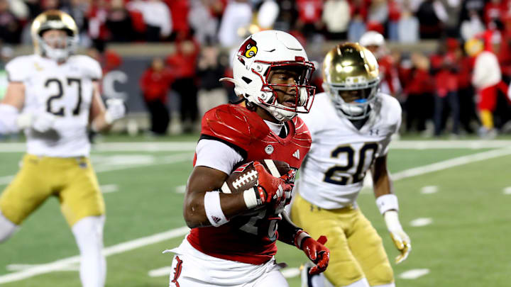 Louisville's Jawhar Jordan scores a touchdown against Notre Dame