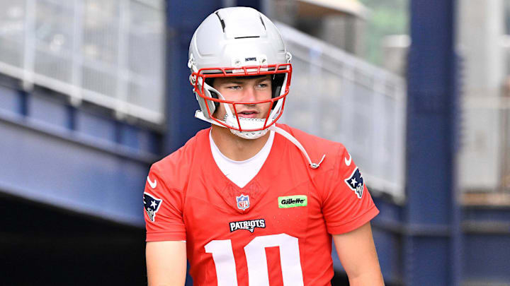 Jun 9, 2025; Foxborough, MA, USA; New England Patriots quarterback Drake Maye (10) and safety Kyle Dugger (23) walk to the practice fields at Gillette Stadium. Mandatory Credit: Eric Canha-Imagn Images Jun 9, 2025; Foxborough, MA, USA; New England Patriots quarterback Drake Maye (10) and safety Kyle Dugger (23) walk to the practice fields at Gillette Stadium. Mandatory Credit: Eric Canha-Imagn Images