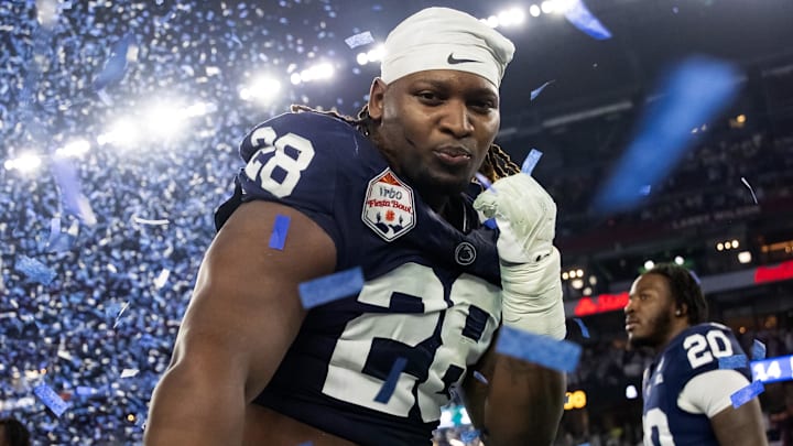 Penn State Nittany Lions defensive tackle Zane Durant (28) celebrates with the Heisman pose after defeating the Boise State Broncos during the Fiesta Bowl.